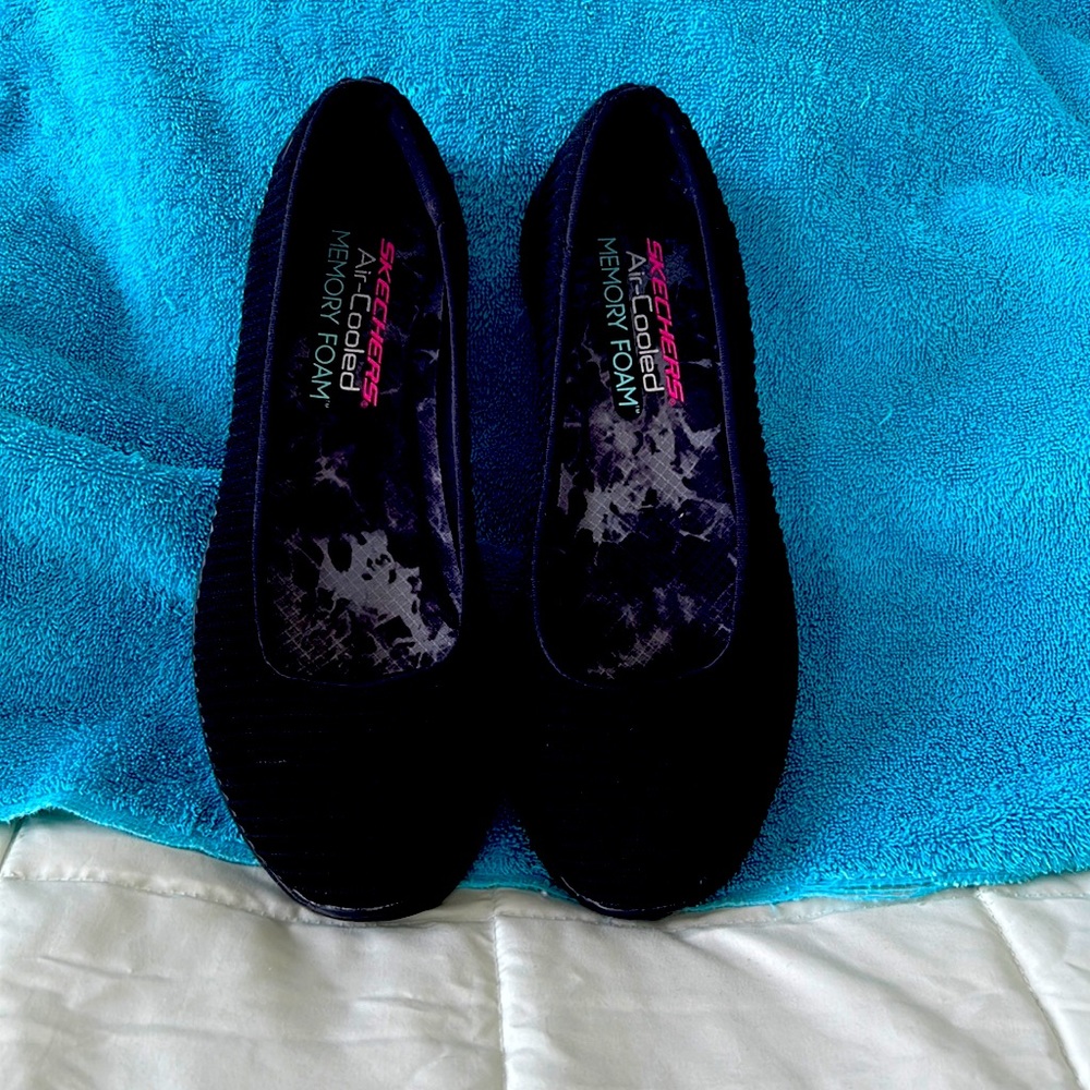 Skechers air cooled memory foam slip on shoe.